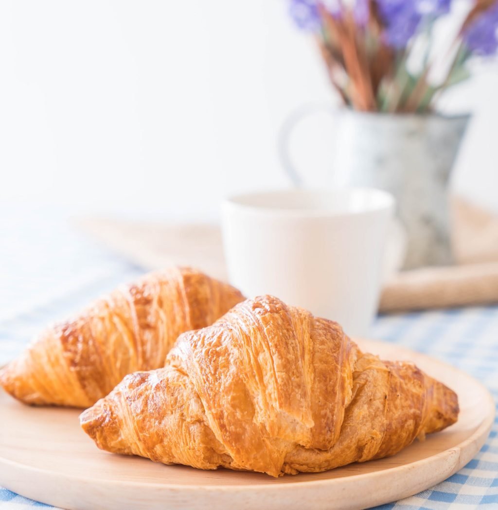 butter croissant on table